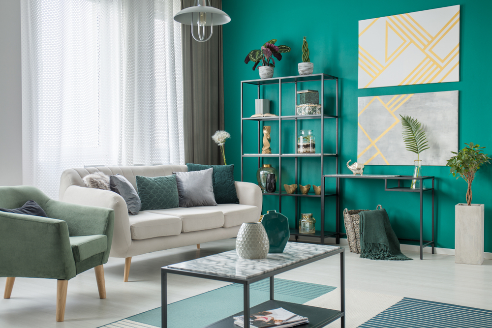 living room with green walls.